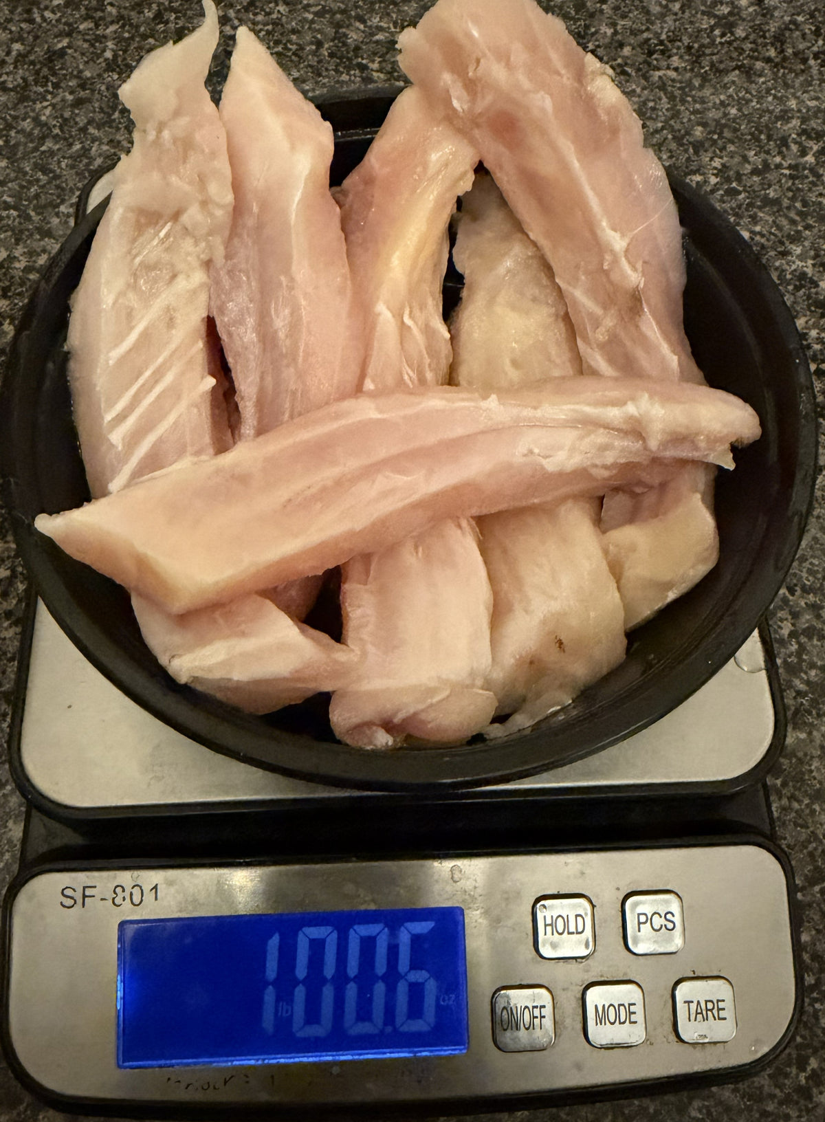 1 pound of buffalo fish ribs on a digital scale