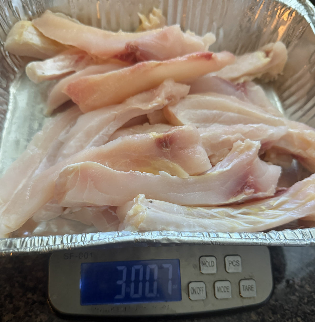 3 pounds of Buffalo Fish ribs on a digital scale